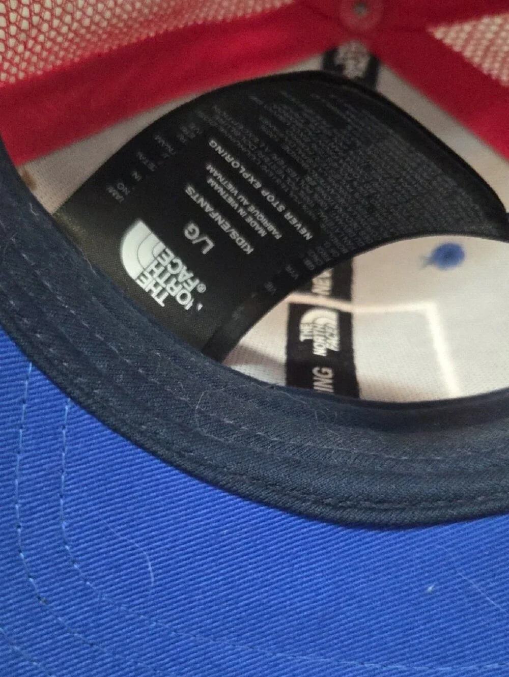 The North Face Kids Royal Blue and Red Mesh Trucker Hat